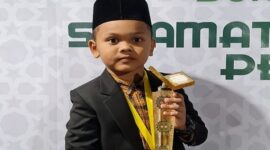 Qori cilik Muhammad Ahsin siswa SD asal Kota Langsa, menjadi pembaca Al-Qur’an pada open ceremony PON XXI Aceh-Sumut di stadion Harapan Bangsa Banda Aceh pada Senin (9/9/24)