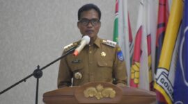 PJ Walikota Langsa Syaridin saat membuka rapat pleno rekapitulasi penghitungan suara Pilkada 