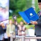 Plt. Sekda Aceh, Drs. Muhammad Diwarsyah, M.Si, saat menjadi Pembina Upacara Hari Guru Nasional 2024 dan HUT PGRI ke-78, di Kantor Gubernur Aceh, Banda Aceh, Kamis, (5/12/2024).
