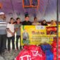 Prosesi penyerahan bantuan masa panik kepada masyarakat korban kebakaran pasar Lamno Jaya, 01/05/2025.