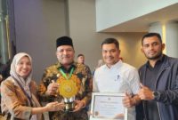 Bupati Bireuen. H. Muklhis.,ST Menerima Penghargaan (UHC) Award 2026 berlangsung di Ballroom JI-EXPO Kemayoran, Jakarta Pusat. Selasa malam (27/01/2026).