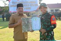 Program TNI Manunggal Membangun Desa (TMMD) Ke-127 Tahun Anggaran 2026 Kodim 0111/Bireuen resmi dibuka melalui sebuah upacara yang berlangsung di Lapangan bola kaki Meunasah Blang Kecamatan Jeunib Kabupaten Bireuen. Selasa (10/02/2026).